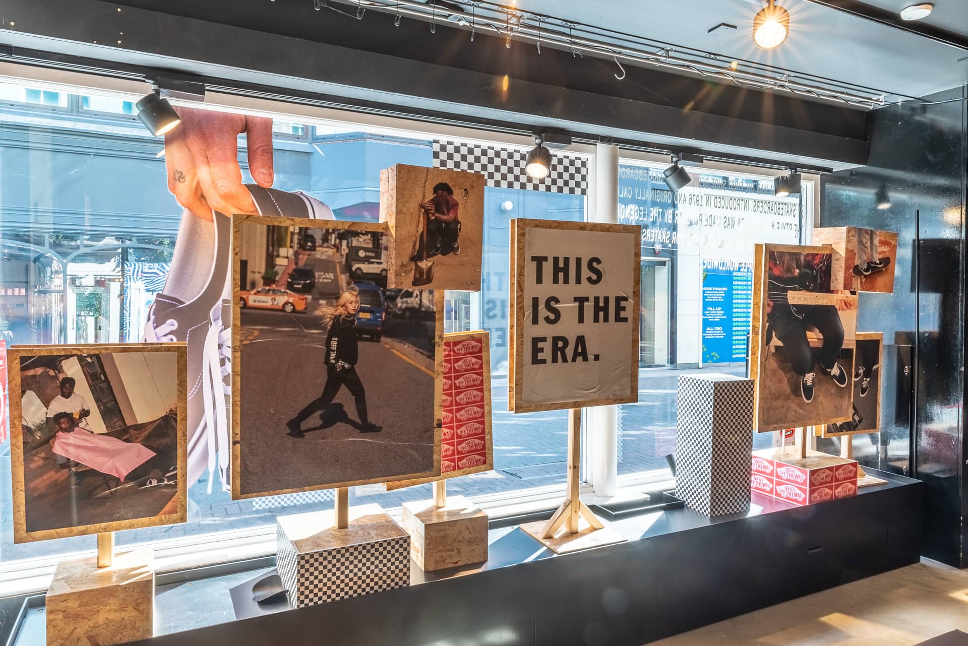 Vans shop with a branded window display from the inside